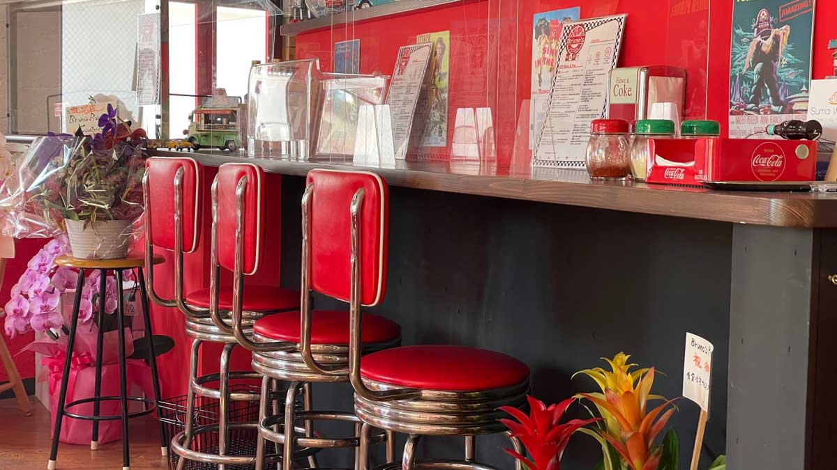 red and white color V shape back bar stools from Bruno’s Pizza diner in Nara Japan